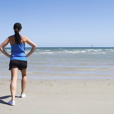 Woman exercising on a beach