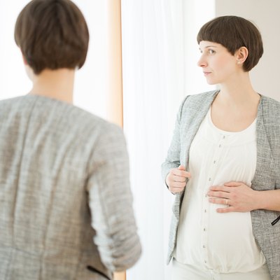 Pregnancy in the mirror reflection