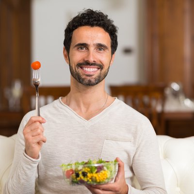 Man eating a salad