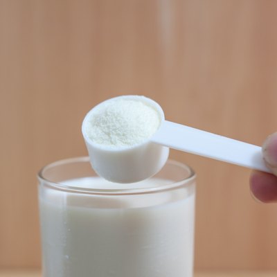 Collagen protein powder in a measuring spoon.