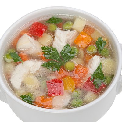 Chicken noodle soup isolated on a white background