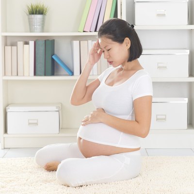 Pregnant woman having headache