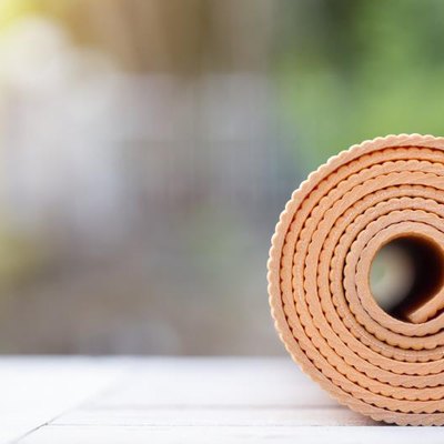 yoga mat on the table in a garden
