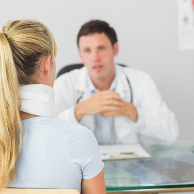 Attractive doctor having an appointment with a patient