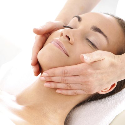 Relax in the spa - woman at face massage