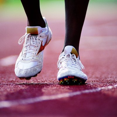 Feet of runner on track