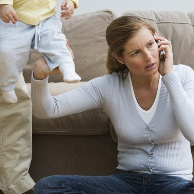 Mid adult woman using a mobile phone