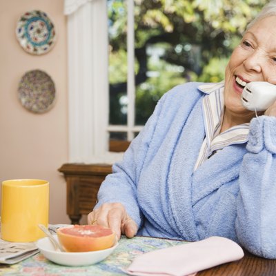 Senior woman talking on telephone
