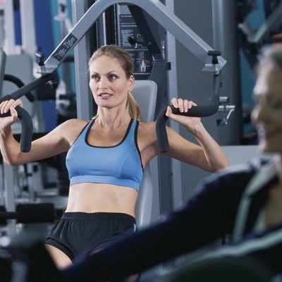 Woman on exercise machine