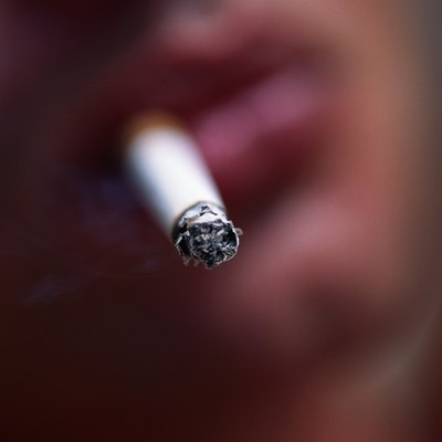 Cigarette in man's mouth