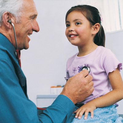 Doctor Taking Girl's Pulse with Stethoscope