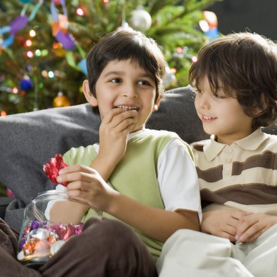 Boys with Christmas candy