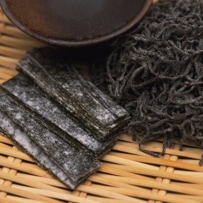 Closed Up Image of Some Dried Seaweed on a Wooden Surface, High Angle View