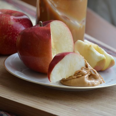 Apples Slices Dipped in Peanut Butter