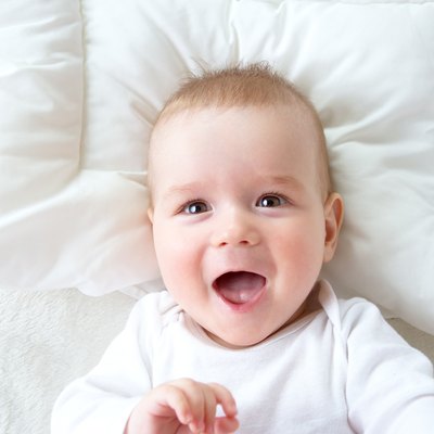 seven month old baby in the bed