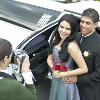 Mother Photographing Couple Departing for Their High School Prom