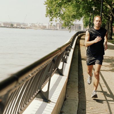 Man running on embankment