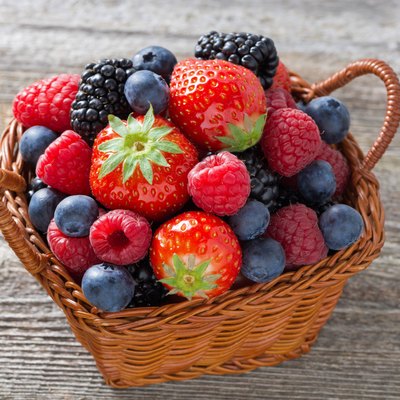 basket with fresh seasonal berries, top view