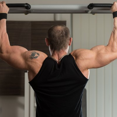 Male Athlete Doing Pull Ups
