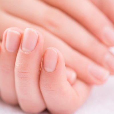 Pleasant woman making hand massage