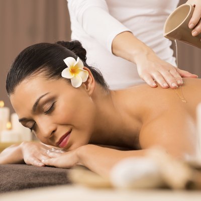Woman Having A Back Oil Massage