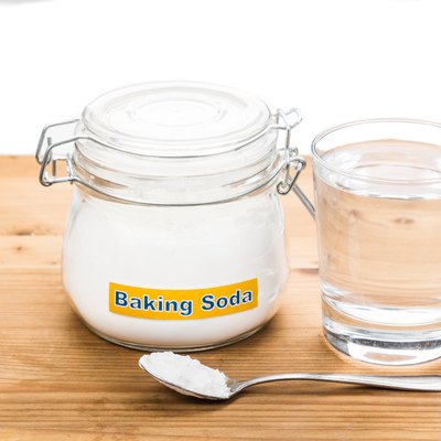 Baking soda with glass of water for multiple holistic usages