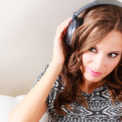 woman in headphones listening music mp3 relaxing
