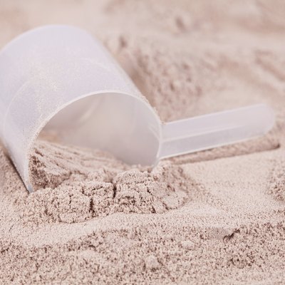 Scoop of chocolate whey isolate protein