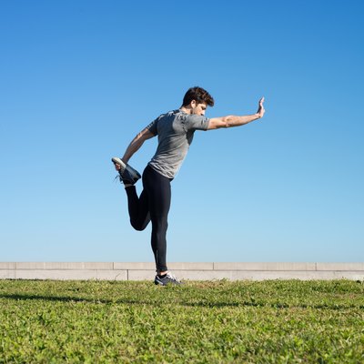 man stretches the body before running space for text