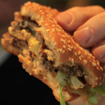Man holding a hamburger