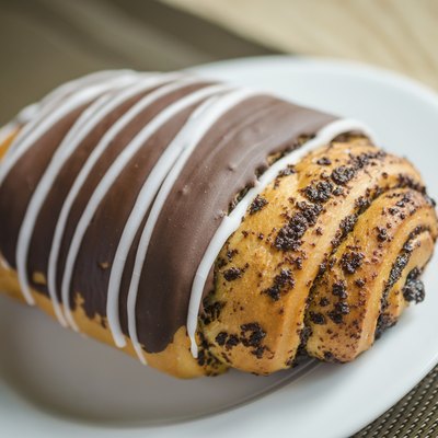 Chocolate bun with poppy seeds