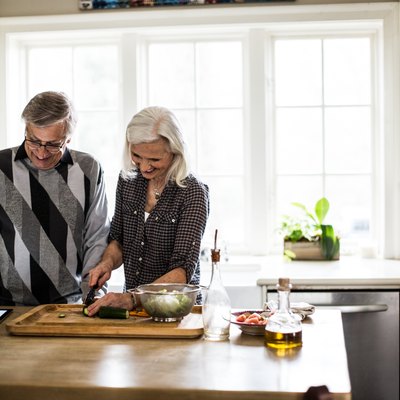 Senior couple preparing dinner