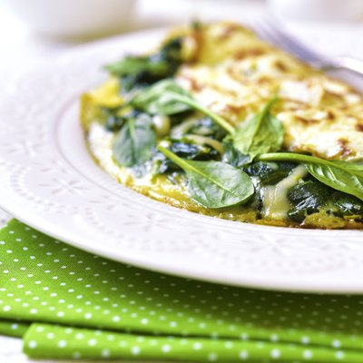 Omelette stuffed with spinach and cheese.