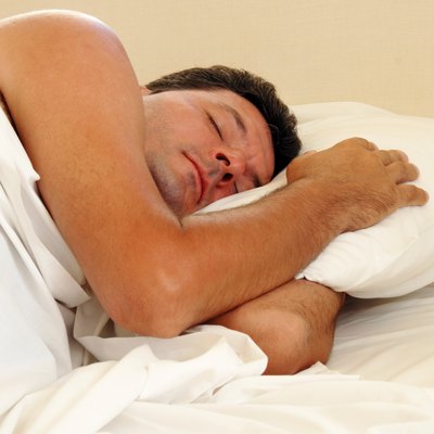 Man sleeping in bed