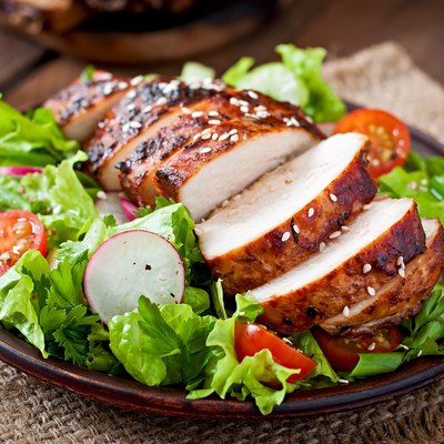 Fresh vegetable salad with grilled chicken breast
