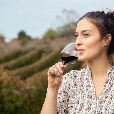 Young Woman Drinking Wine