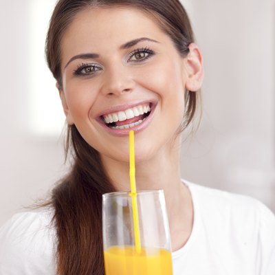 Women drinking orange juice
