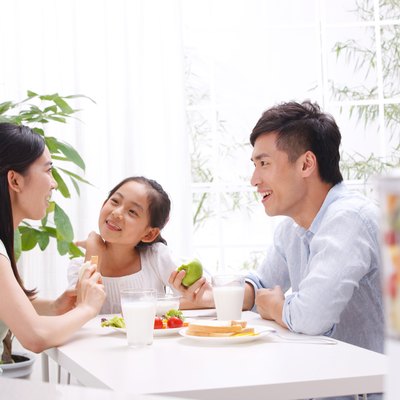 Family eating in kitchen