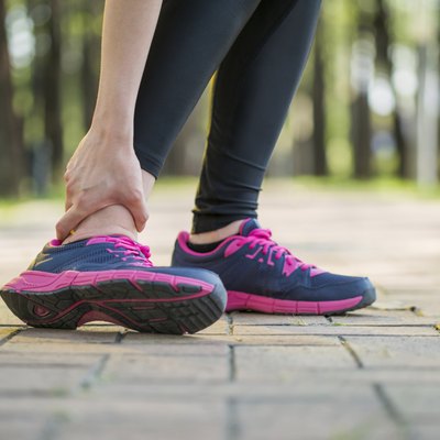 woman runner hold twisted ankle Pain ,Human Leg