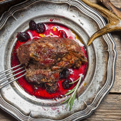 Venison served with cranberry sauce