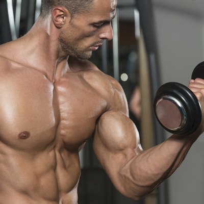 Young Man Working Out Biceps