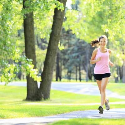 Jogging woman running in park