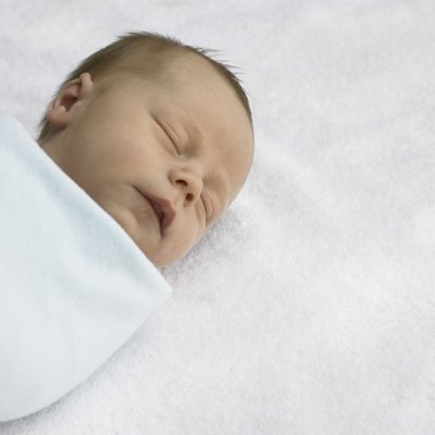 Newborn baby boy (0-3 months) sleeping