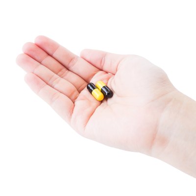 drug hand holding isolated white background