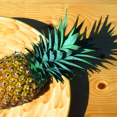 Pineapple in basket, directly above