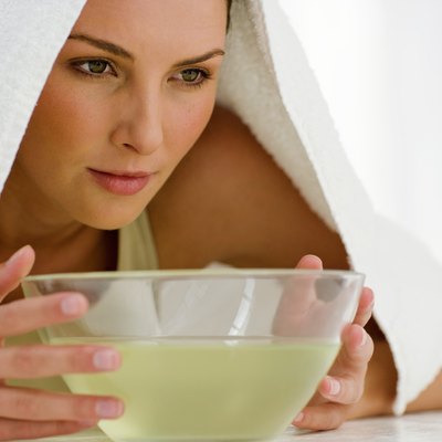 Woman with a sinus therapy bowl