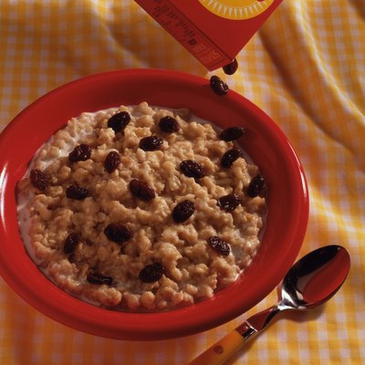 Raisins pouring over oatmeal