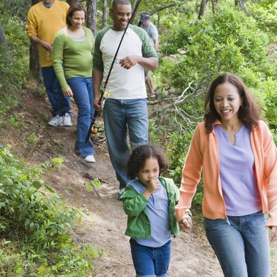 Family hiking on trail
