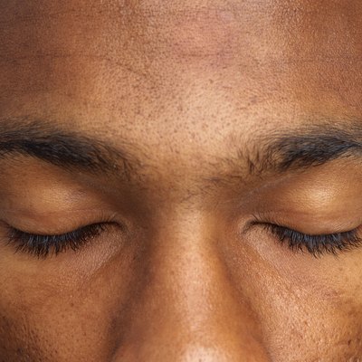 close-up of a man's eyes shut