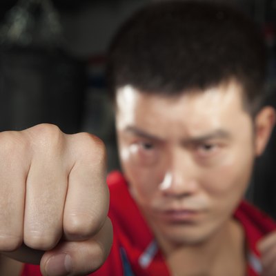 Close up of boxer throwing a punch at the camera